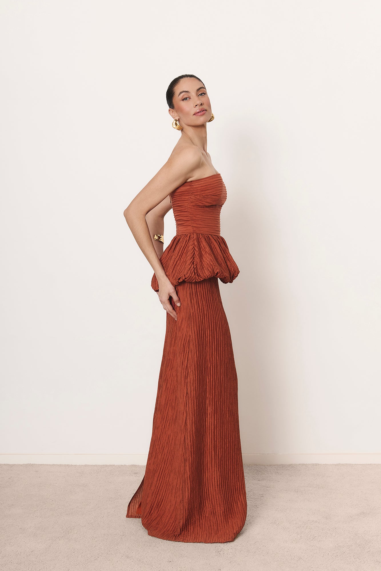 Camellia set in burnt orange