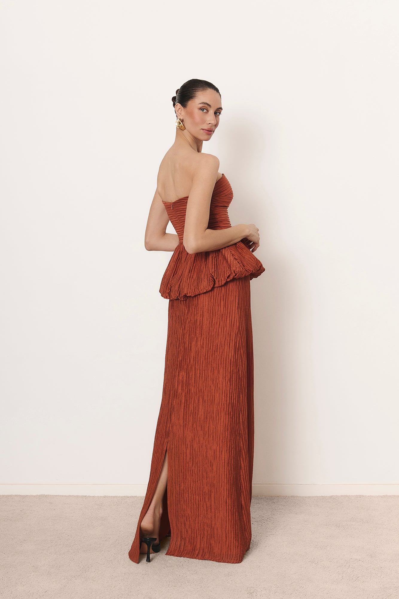 Camellia set in burnt orange