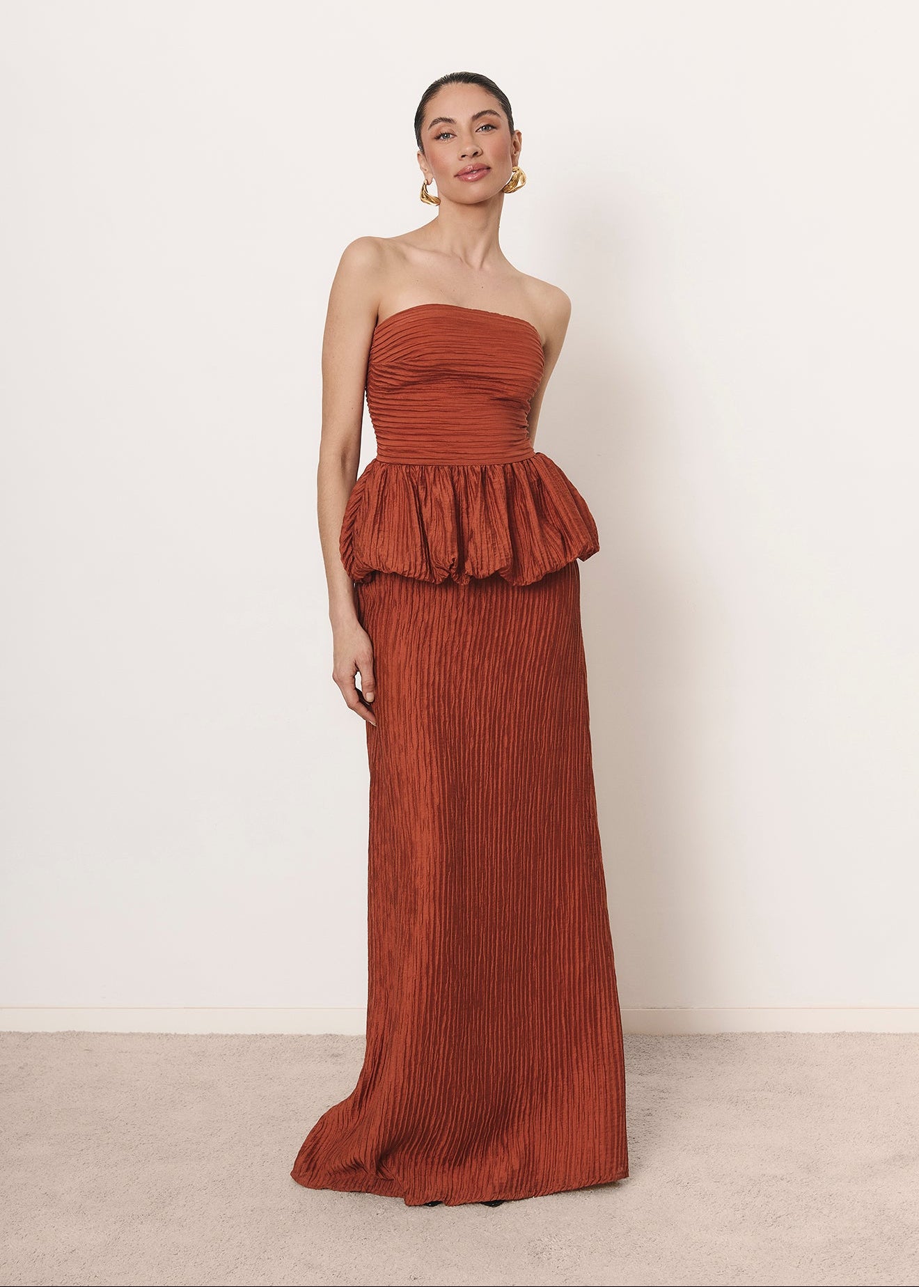 Camellia set in burnt orange